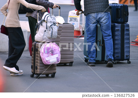 Tokyo cityscape in Japan Inbound tourism continues... Suitcases... In front of JR Shibuya Station, foreign tourist families 136827526