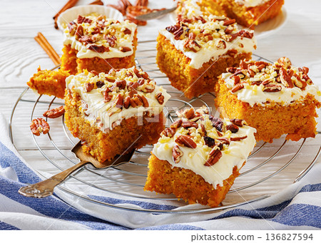 Carrot cake squares with cream cheese and pecan Carrot cake squares with cream cheese and pecan 136827594