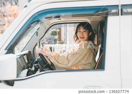 Housewife riding a light freight car 136827774