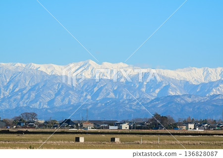 Echigo Plain and Iide Mountain Range in winter (Niigata City, Niigata Prefecture) Echigo Plain and Iide Mountain Range in winter (Niigata City, Niigata Prefecture) 136828087