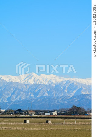 Echigo Plain and Iide Mountain Range in winter (Niigata City, Niigata Prefecture) Echigo Plain and Iide Mountain Range in winter (Niigata City, Niigata Prefecture) 136828088
