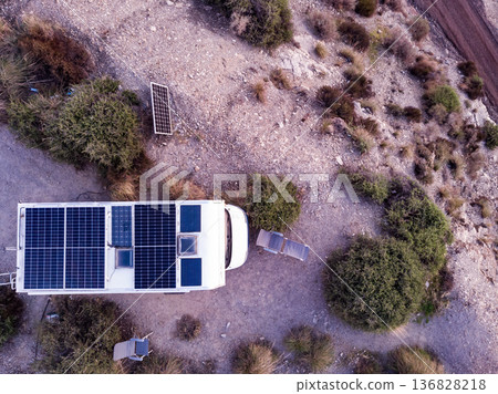 Caravan with solar panels on roof on sea, Spain. Aerial view. Caravan with solar panels on roof on sea, Spain. Aerial view. 136828218