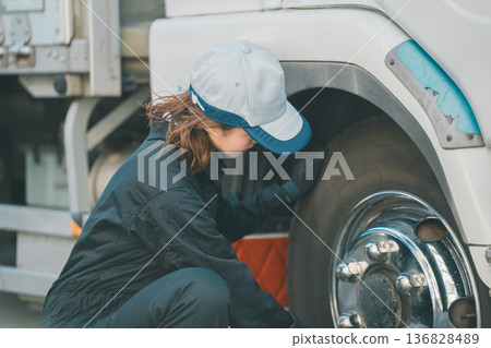 Female truck mechanic Female truck mechanic 136828489