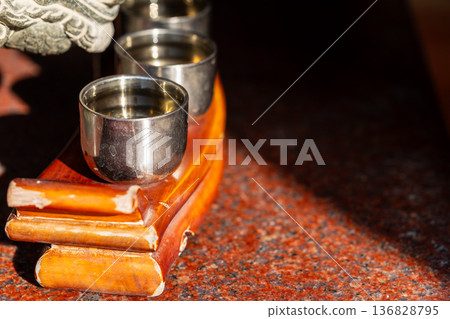 Three cups of wine in traditional sacrificial ceremonies 136828795