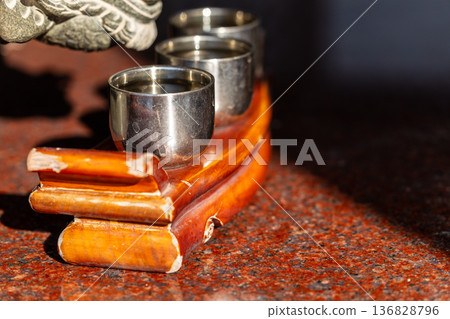 Three cups of wine in traditional sacrificial ceremonies Three cups of wine in traditional sacrificial ceremonies 136828796