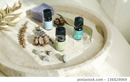 Aromatic perfumed oil for calm and mental health. Aromatherapy with natural herbs. Template, background for design, mockup. Composition with natural objects. 136829069