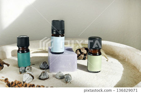 Aromatic perfumed oil for calm and mental health. Aromatherapy with natural herbs. Template, background for design, mockup. Composition with natural objects. Aromatic perfumed oil for calm and mental health. Aromatherapy with natural herbs. Template, background for design, mockup. Composition with natural objects. 136829071