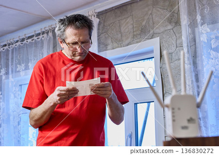 Before using new repeater man reads instruction included in box. 136830272