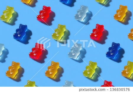 Colorful gummy bear pattern on blue background flat lay candy design 136830576