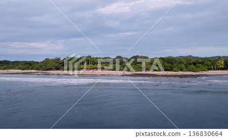 Avellanas Beach Costa Rica tropical coastline with dense jungle 136830664