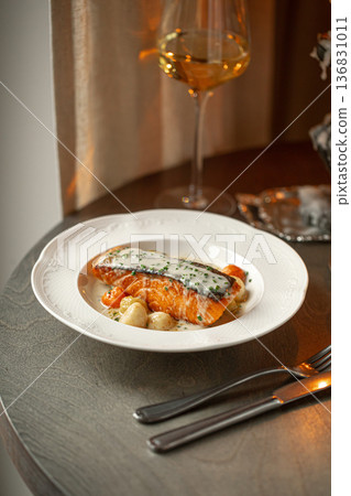 Salmon with potatoes in beurre blanc sauce Salmon with potatoes in beurre blanc sauce 136831011