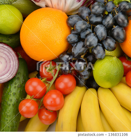 Fresh Seasonal Fruits and Vegetables Arranged in a Bright Organic Food Background Fresh Seasonal Fruits and Vegetables Arranged in a Bright Organic Food Background 136831106