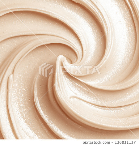 Creamy cosmetic smear in macro style on neutral cappuccino backdrop showing skincare texture with smooth detail concept Creamy cosmetic smear in macro style on neutral cappuccino backdrop showing skincare texture with smooth detail concept 136831137