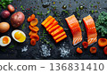 Flat lay composition of vitamin A ingredients on black textured background, healthy lifestyle concept 136831410