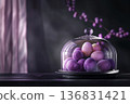 Purple and pink dyed Easter eggs under glass dome on dark background, dramatic festive styling 136831421