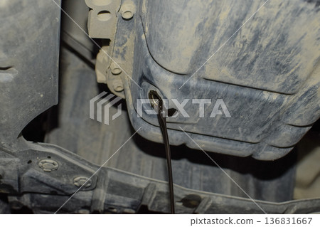 Drain the old oil from the engine through the drain plug 136831667