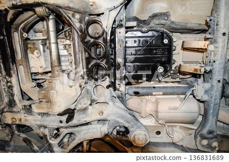 View of the car from below. Autoservice center. Car maintenance. View of the car from below. Autoservice center. Car maintenance. 136831689