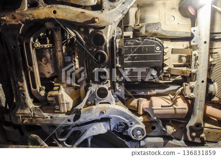 View of the car from below. Autoservice center. Car maintenance. View of the car from below. Autoservice center. Car maintenance. 136831859