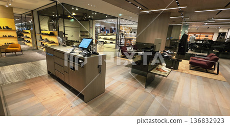 Berlin, Germany - September 19, 2025: Modern retail store interior with stylish displays and elegant design Berlin, Germany - September 19, 2025: Modern retail store interior with stylish displays and elegant design 136832923