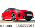 Red car on white background. Stylish, modern, bright image of the car for design solutions. 136833364