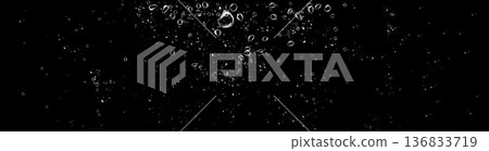 Realistic oxygen bubbles in water on a black background with fizzy sparkles and effervescent style. Transparent drops and soap bubbles create a vector texture for sea, aquarium, or fresh design Realistic oxygen bubbles in water on a black background with fizzy sparkles and effervescent style. Transparent drops and soap bubbles create a vector texture for sea, aquarium, or fresh design 136833719
