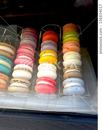 Display of Colorful Macaroon Cookies in a Pastry Shop During Busy Afternoon Hours Display of Colorful Macaroon Cookies in a Pastry Shop During Busy Afternoon Hours 136834017