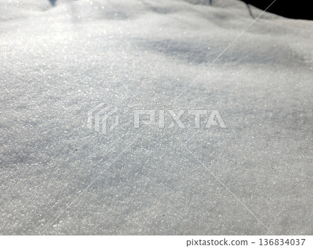 Snow Texture Covering Ground in Winter Season at a Quiet Location Snow Texture Covering Ground in Winter Season at a Quiet Location 136834037