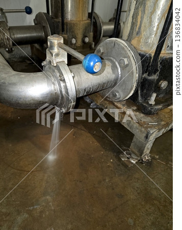Water Leakage Observed From Butterfly Faucet in an Industrial Setting During Daytime Water Leakage Observed From Butterfly Faucet in an Industrial Setting During Daytime 136834042