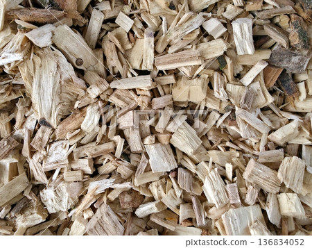 Wood Chips Scattered on the Ground at a Construction Site During Daylight Hours 136834052