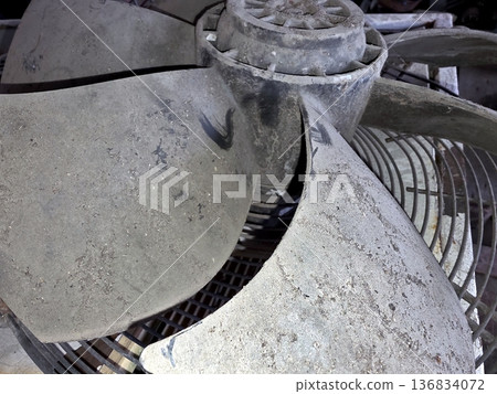A Fan Impeller Shows Signs of Dirt and Wear in a Workshop 136834072