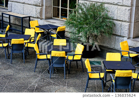 Landscape with a yellow chair 136835624