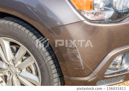 Rust and scratches on a car Rusty iron plate of an old car Rust and scratches on a car Rusty iron plate of an old car 136835811
