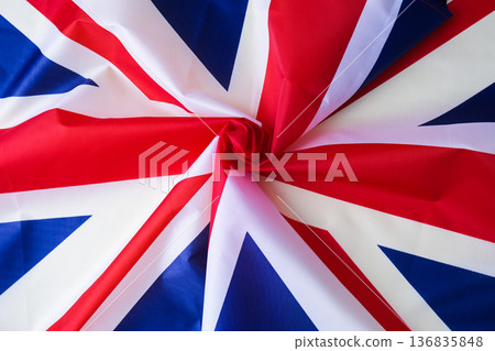 National symbol of Great Britain. British full framed wave UK fabric flag background. Copy space. Concept of Independence 136835848