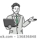 A young male businessman giving a presentation with a laptop 136836848