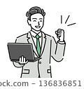 A young male businessman holding a laptop and giving a thumbs up with a smile 136836851