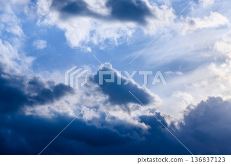 Dark clouds and blue sky Dark clouds and blue sky 136837123