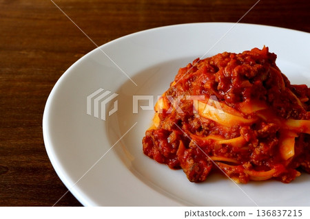 Tagliatelle with bolognese on the table background 136837215