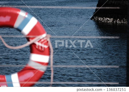 Guarding the Sea: Life rings and deep blue ripples at Yokohama Port Guarding the Sea: Life rings and deep blue ripples at Yokohama Port 136837251
