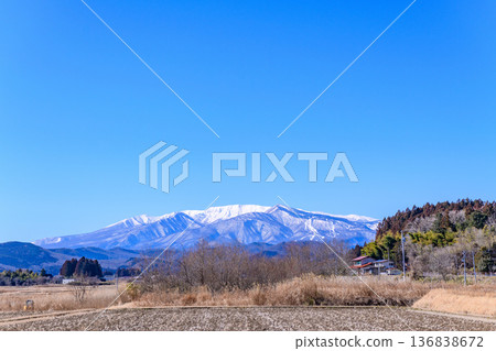 Snowy Zao, blue skies and rural mountains waiting for spring 136838672