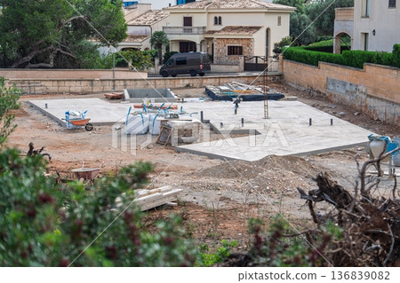 Construction Site in Mallorica Foundation of a New House in a Residential Area, Spain Construction Site in Mallorica Foundation of a New House in a Residential Area, Spain 136839082