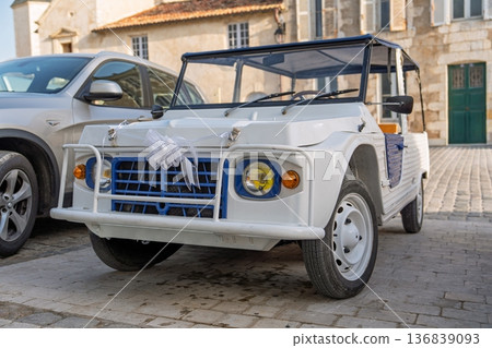 Charming White Vintage Car in Picturesque French Setting, france. A Classic Auto for Special Events 136839093