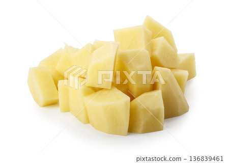 Diced raw potatoes isolated on a white background Diced raw potatoes isolated on a white background 136839461