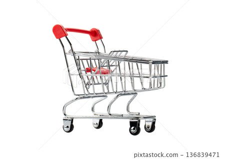Mini model of red shopping cart in supermarket trolley isolated on white background Mini model of red shopping cart in supermarket trolley isolated on white background 136839471