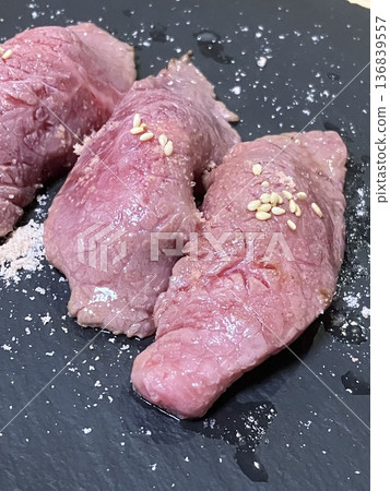 Wagyu beef sushi, close-up, black plate, presentation, meat sushi, high-end gourmet, Japanese cuisine 136839557