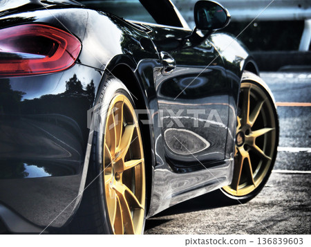 sleek black sports car 136839603