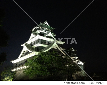 Illuminated Kumamoto Castle Tower, a famous castle floating in the darkness of the night, Kumamoto Prefecture 136839978