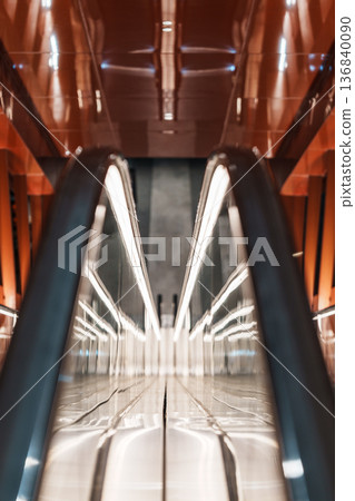 Orange modern architectural space and symmetrical escalator Orange modern architectural space and symmetrical escalator 136840090
