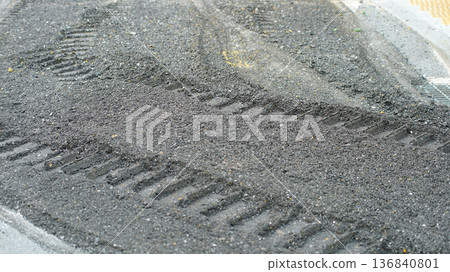 Wheel marks on crushed asphalt surface Wheel marks on crushed asphalt surface 136840801