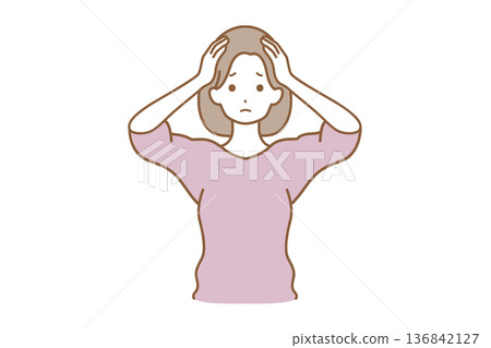 A woman holding a head 136842127