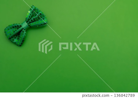Beautiful table setting for St. Patricks Day celebration on green background Beautiful table setting for St. Patricks Day celebration on green background 136842789